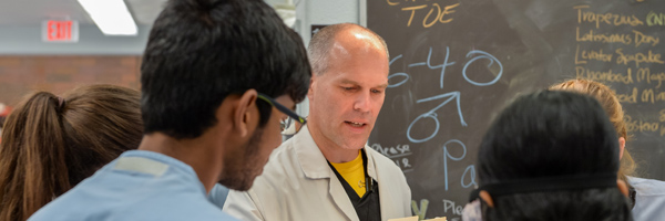 Christopher Vinyard, Ph.D, working with students