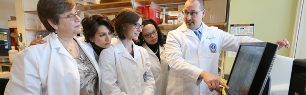 Jason Richardson, Ph.D., and others in a lab