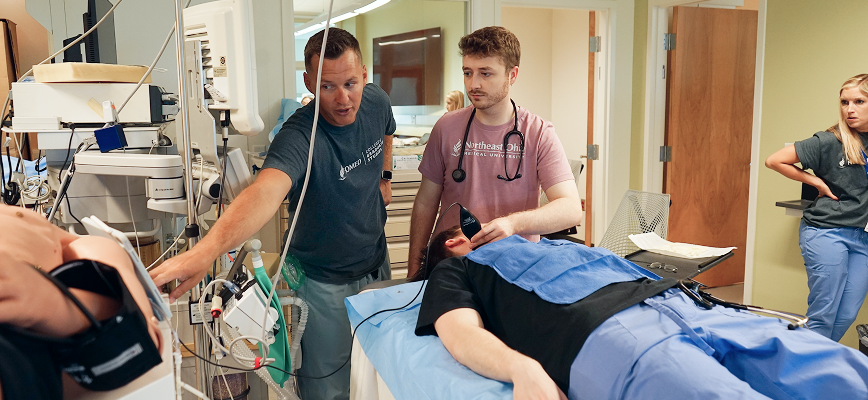 Faculty working with a student