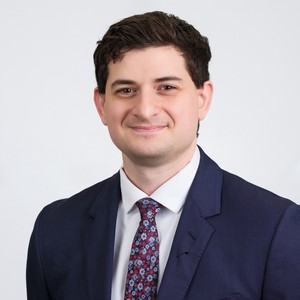 Headshot of Jacob Romero on a white background