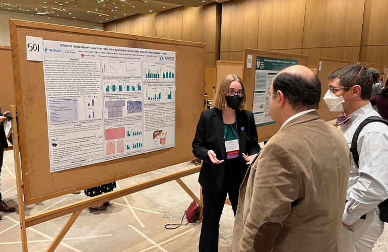 Julie Centofanti with her poster
