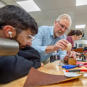 A faculty member helps a student in a lab in the College of Graduate Studies at NEOMED.