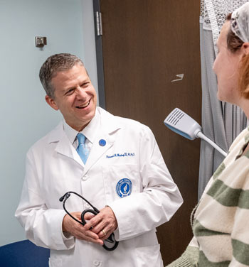 A doctor talking to a patient