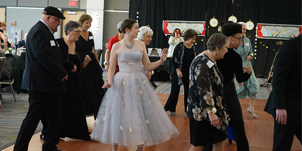 Older adults and students enjoy a “senior” prom