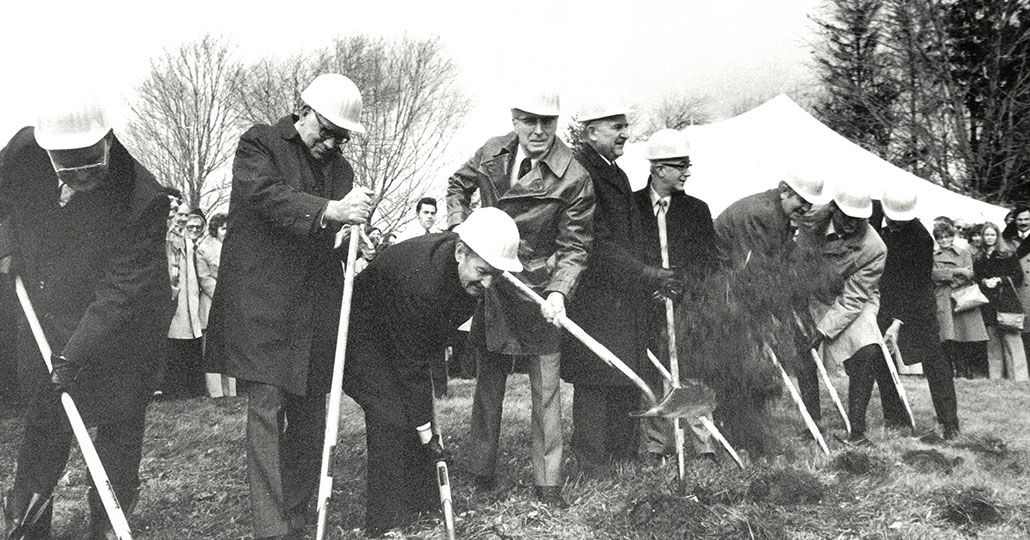 A groundbreaking ceremony in 1973 for NEOMED, where people shoveled dirt.