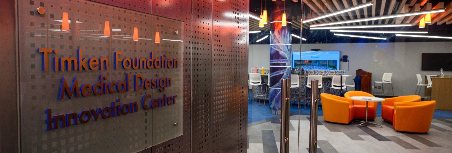 A wide view of the Timken Medical Device Innovation Center at NEOMED, including the sign.