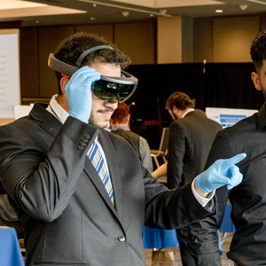 A man demos a VR headset.