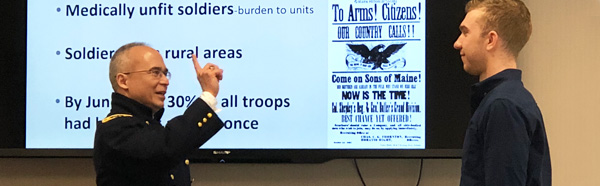 Fred Marquinez, M.D. (’85) and student