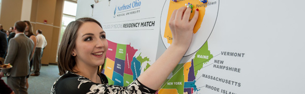 Student pinning match location on map