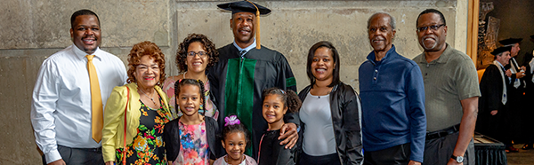 Carl Allamby, M.D. (’19), and his family