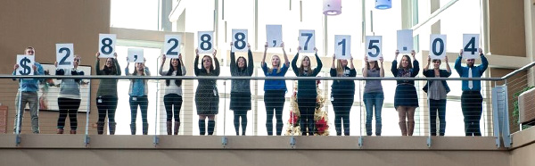 Students holding numbers