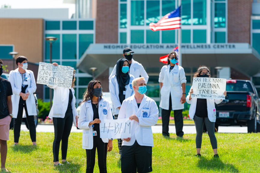 Students, faculty and staff at the White Coats for Black Lives protest