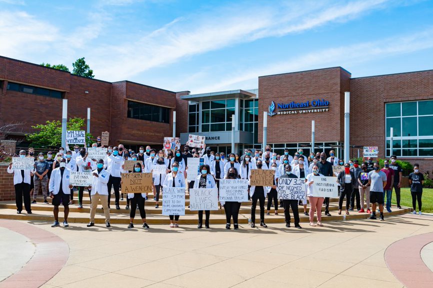 Students, faculty and staff at the White Coats for Black Lives protest