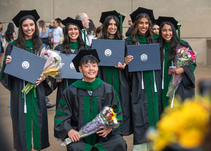 A group of medicine students pose for a photo.