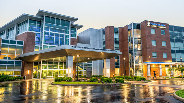 The front of NEOMED on a rainy day.