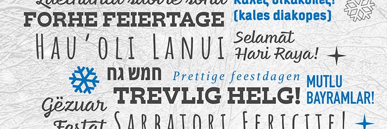 The words Holiday Greetings in several languages.