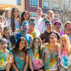 Students at an event celebrating the Hindu festival of colors.