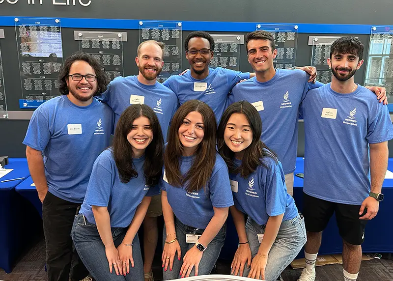 A group of orientation leaders in blue NEOMED t-shirts.